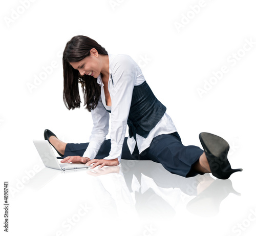Photo: Flexible business woman with laptop Flexible business woman with laptop