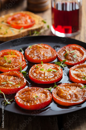 Photo: baked tomatoes with herbs and olive oil baked tomatoes with herbs and olive oil