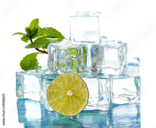 Photo: Ice with mint and lime on light background Ice with mint and lime on light background