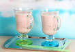 Cream cocktails on brightblue background