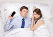 businessman and woman in bed