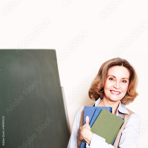 Photo: lachende Lehrerin lachende Lehrerin