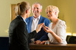 Reception - Guests check in a hotel