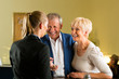 Reception - Guests check in a hotel