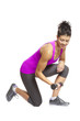 Young woman exercising holding dumbbells