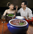 Feijoada - Brazilian meat & bean stew, side dishes & caipirinha