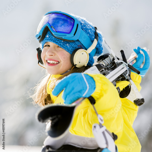 Photo: Skiing, winter sports - portrait of young skier Skiing, winter sports - portrait of young skier