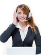 Photo: Smiling attractive woman on line in help desk Smiling attractive woman on line in help desk