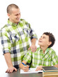 Photo: Father helping son with homework Father helping son with homework