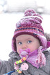 portrait of a one year old girl during winter