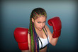 Girl with red boxing gloves