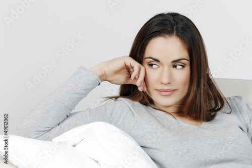 Photo: beautiful woman on the sofa beautiful woman on the sofa