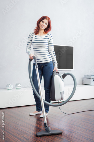 Photo: Attractive Female with Vacuum Cleaner Attractive Female with Vacuum Cleaner