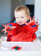 Foto: Child with painted hands Child with painted hands