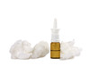 Nasal spray and used tissues. Cold and flu or allergy concept