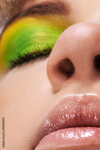 Photo: eyes, eyes, nose and lips of beautiful young woman eyes, eyes, nose and lips of beautiful young woman