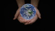 Holding globe
