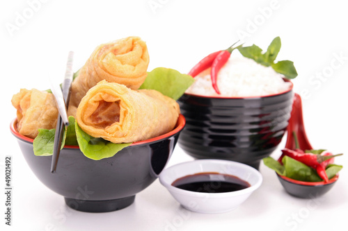 Photo: isolated spring roll and rice isolated spring roll and rice