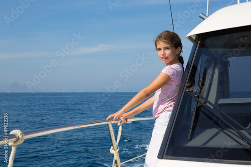 Photo: child happy girl sailing happy boat child happy girl sailing happy boat
