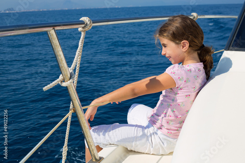 Photo: child happy girl sailing happy boat child happy girl sailing happy boat