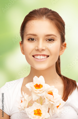Photo: beautiful woman with white flower beautiful woman with white flower
