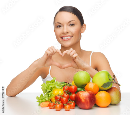 Photo: woman with fruits and vegetables woman with fruits and vegetables