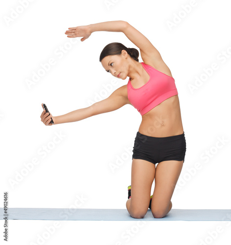 Photo: beautiful sporty woman doing exercise beautiful sporty woman doing exercise