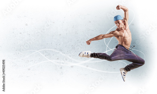 Photo: young man dancing hip hop with color lines young man dancing hip hop with color lines