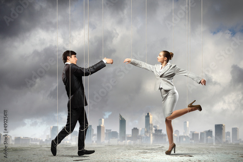 Photo: Puppet businesspeople Puppet businesspeople