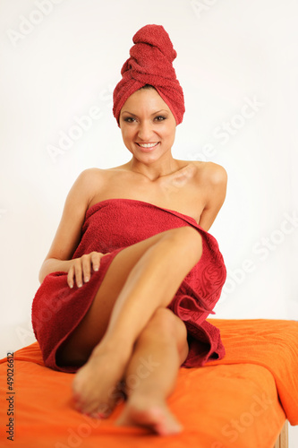 Photo: Frau auf Massageliege Frau auf Massageliege