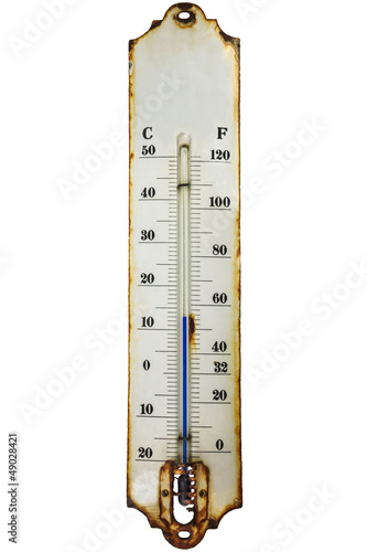 Photo: Antique rusty thermometer isolated on white Antique rusty thermometer isolated on white