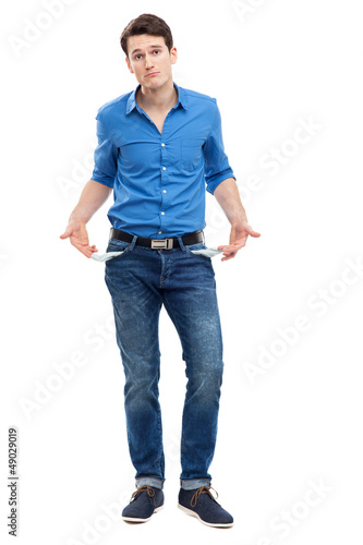 Photo: Man showing empty pockets Man showing empty pockets