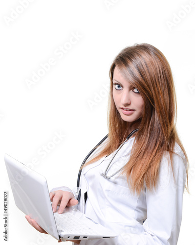 Photo: female student doctor working with notebook female student doctor working with notebook