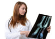 Photo: female doctor looking at X-ray image female doctor looking at X-ray image