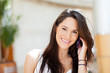 Foto: beautiful young casual woman talking on cell phone beautiful young casual woman talking on cell phone