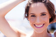 closeup of cute young woman laughing