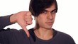 Video: young man showing thumbs down young man showing thumbs down