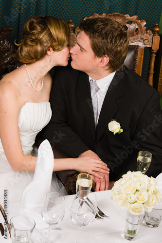 Photo: Bride and groom kiss Bride and groom kiss