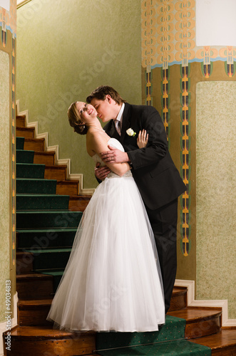 Photo: Bride and groom kiss Bride and groom kiss