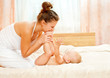 Photo: Mother and daughter play in the bedroom Mother and daughter play in the bedroom
