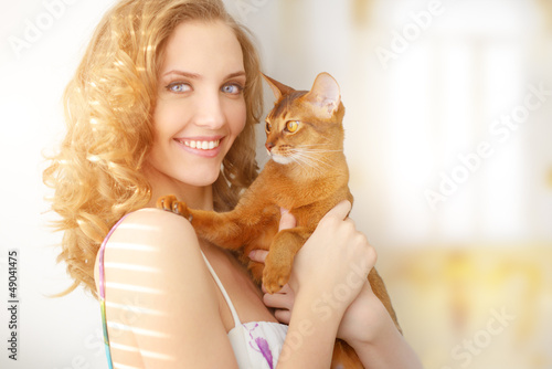 Photo: girl with Abyssinian cat girl with Abyssinian cat