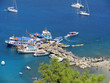 Photo: Harbor in Lindos - popular tourist destination, Rhodes, Greece. Harbor in Lindos - popular tourist destination, Rhodes, Greece.