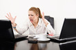 Business woman multitasking and frustrated by modern technology