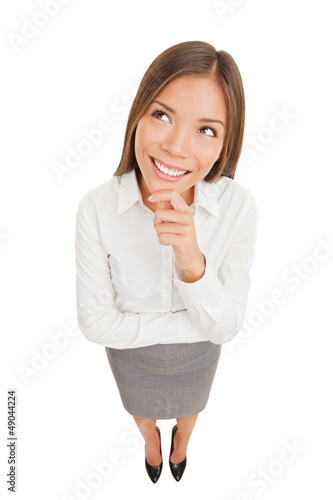 Photo: Thinking beautiful smiling business woman Thinking beautiful smiling business woman