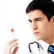 Doctor with syringe, isolated