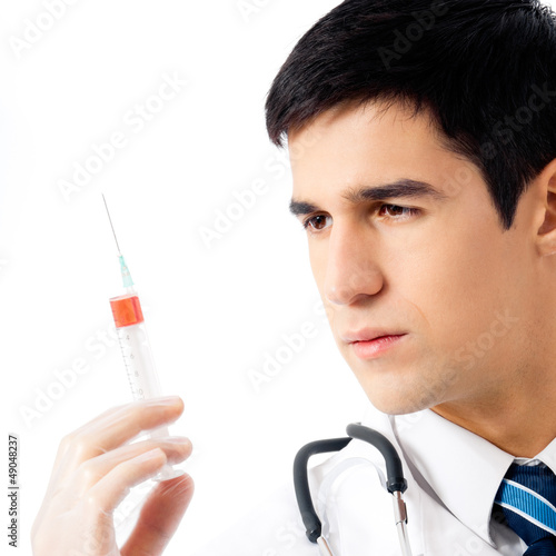 Photo: Doctor with syringe, isolated Doctor with syringe, isolated