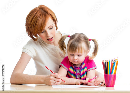 Photo: mother and her child girl pencil together mother and her child girl pencil together