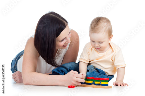 Photo: baby boy and mother playing together baby boy and mother playing together
