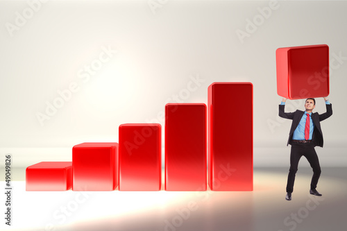 Photo: business man pushing the growth bar up business man pushing the growth bar up