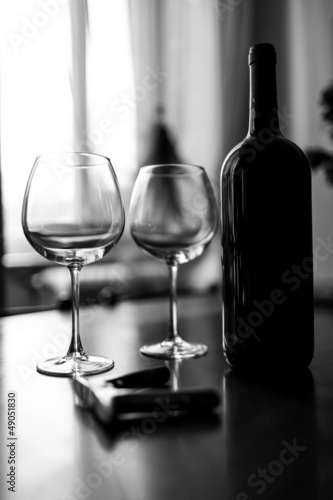 Photo: Glasses and wine bottle B&W image Glasses and wine bottle B&W image